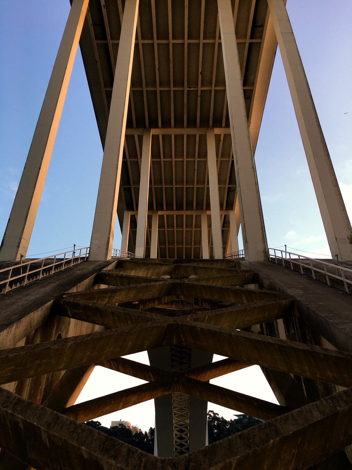 Climbing a bridge over the Douro in Porto at sunset
